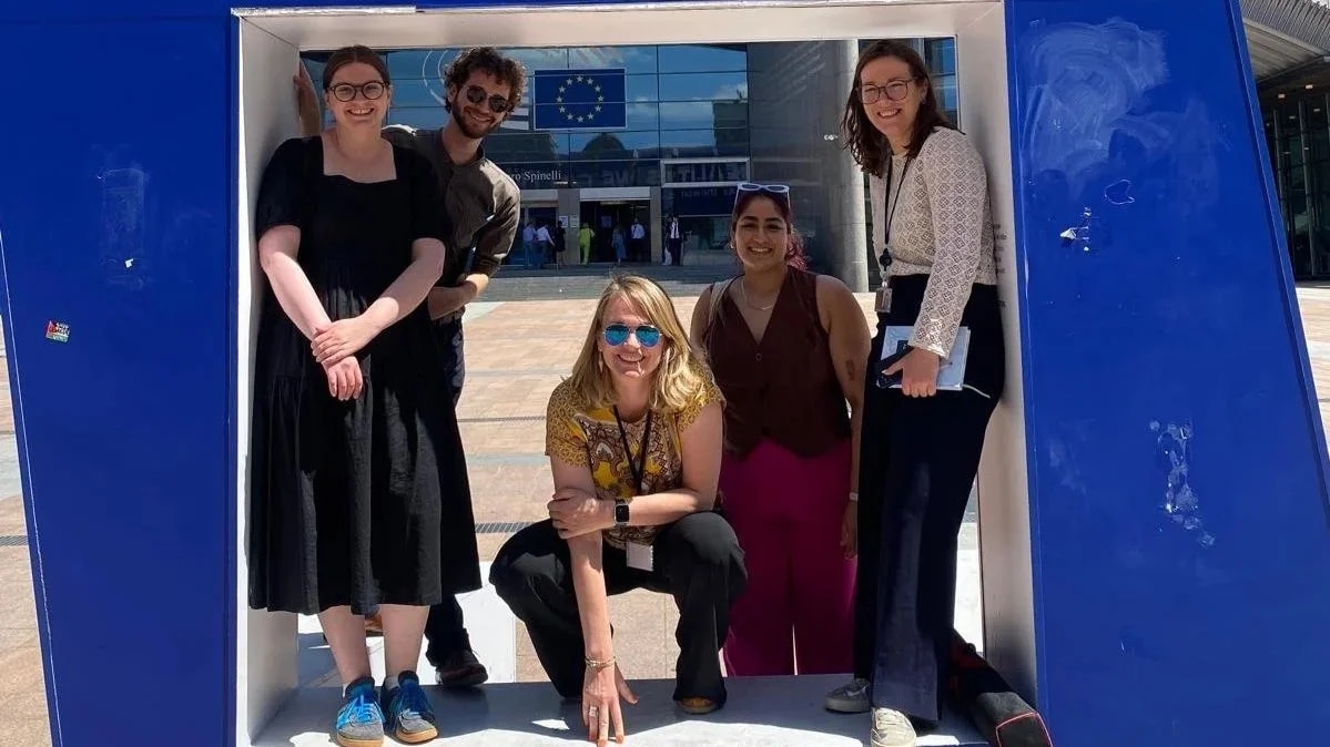Opportunity Green team in front of the European Parliament