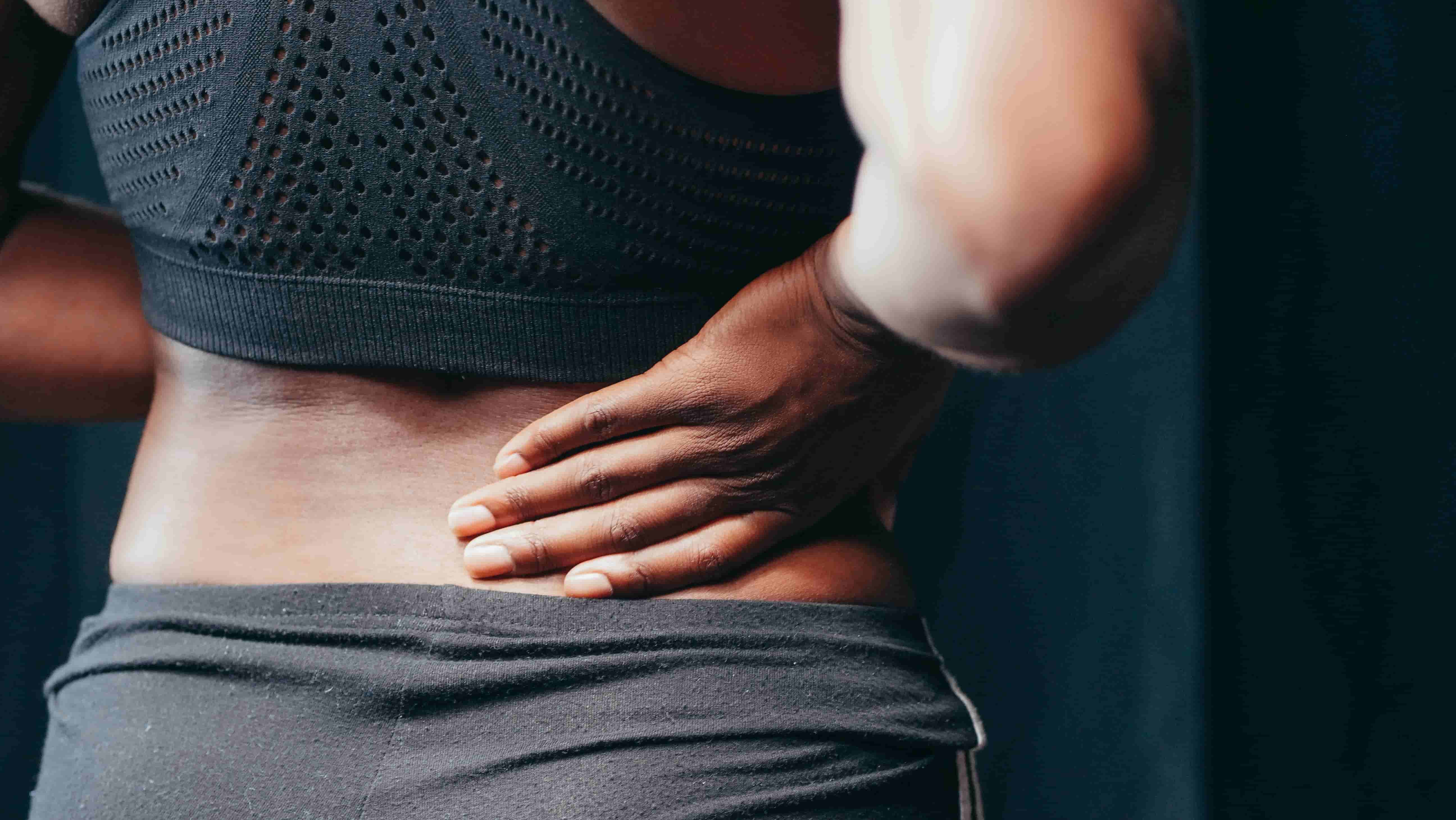 Person having lower back pain