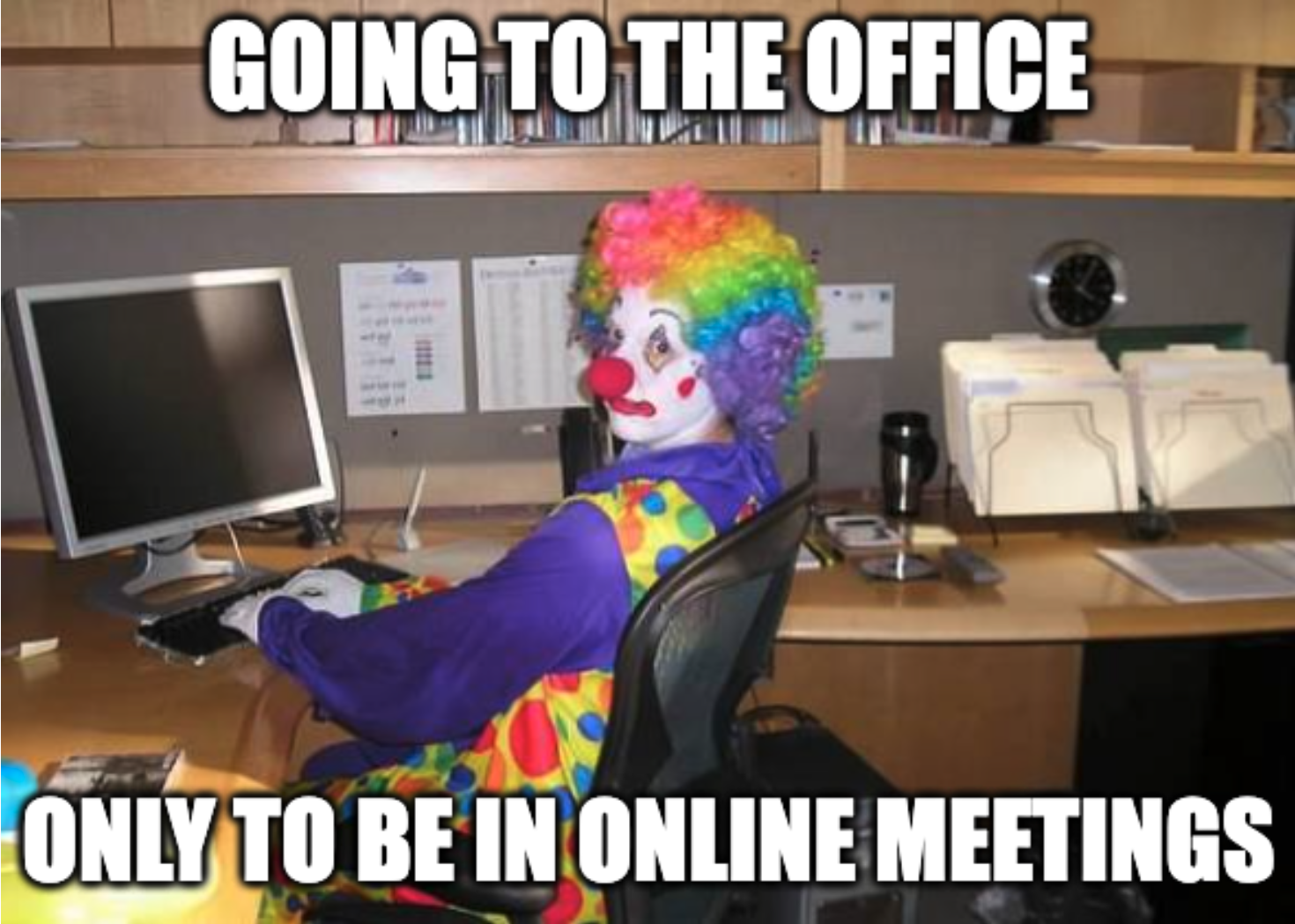 Clown working in the office