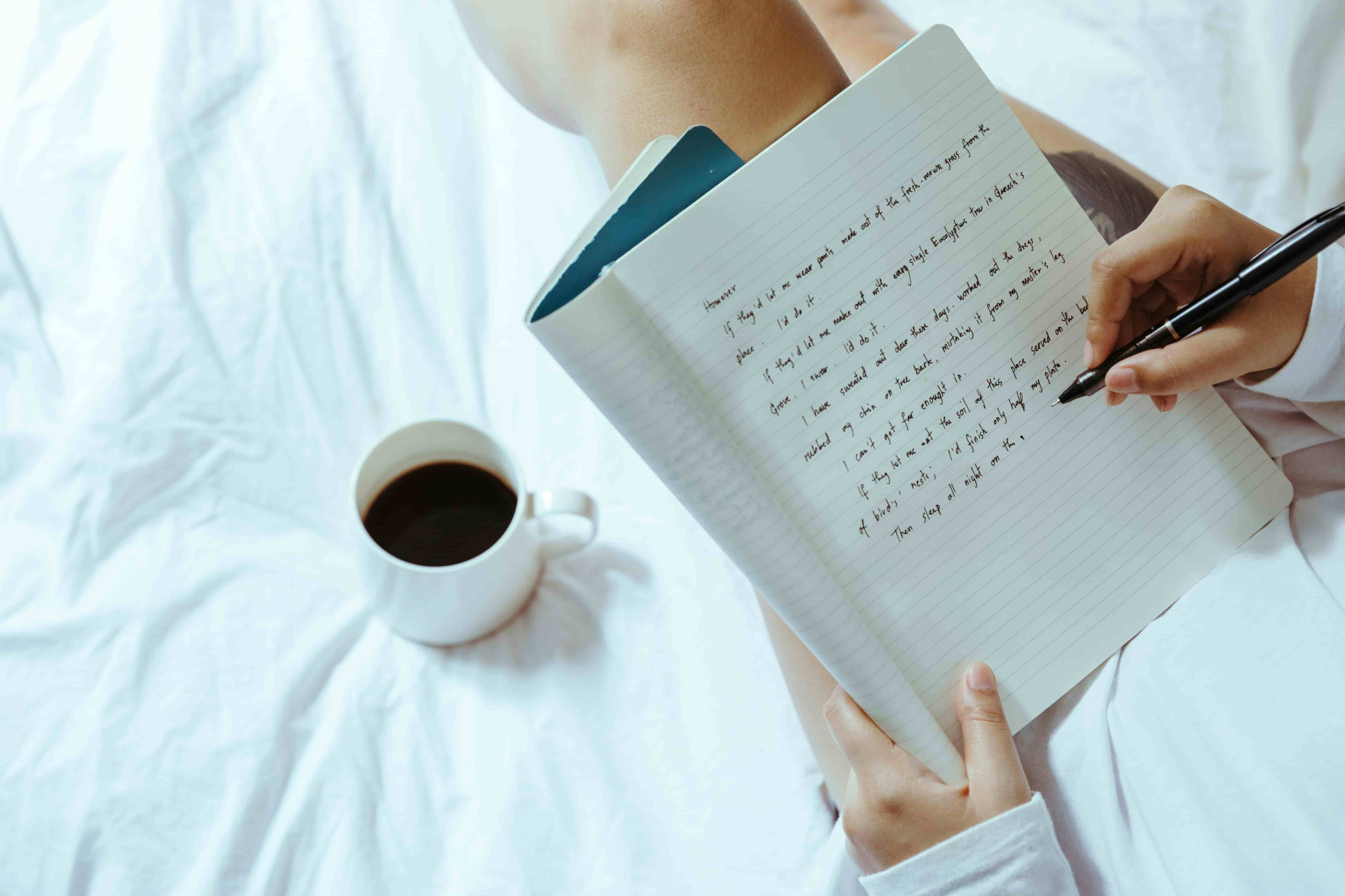 Woman reframing and writing