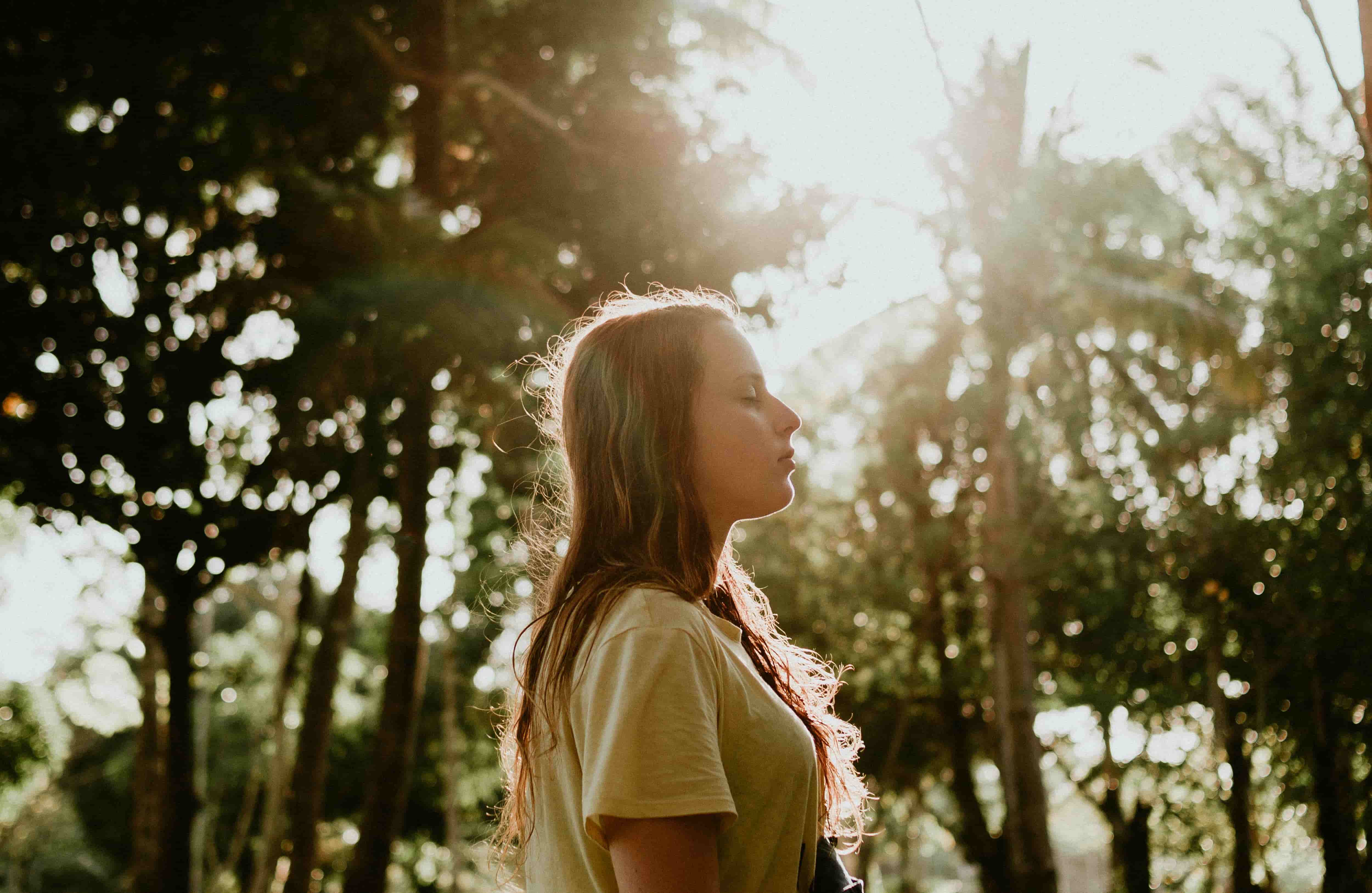 Woman taking a deep breath