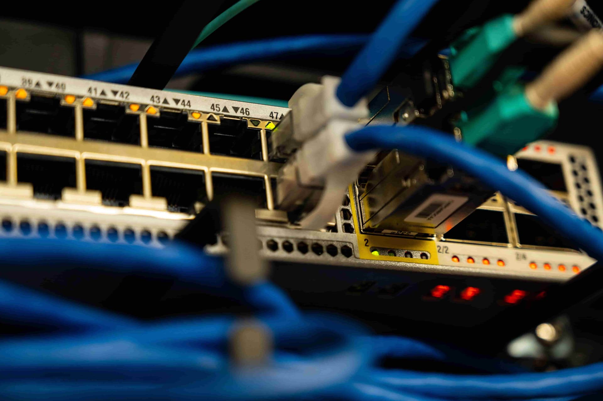 A router with its connection lights blinking.