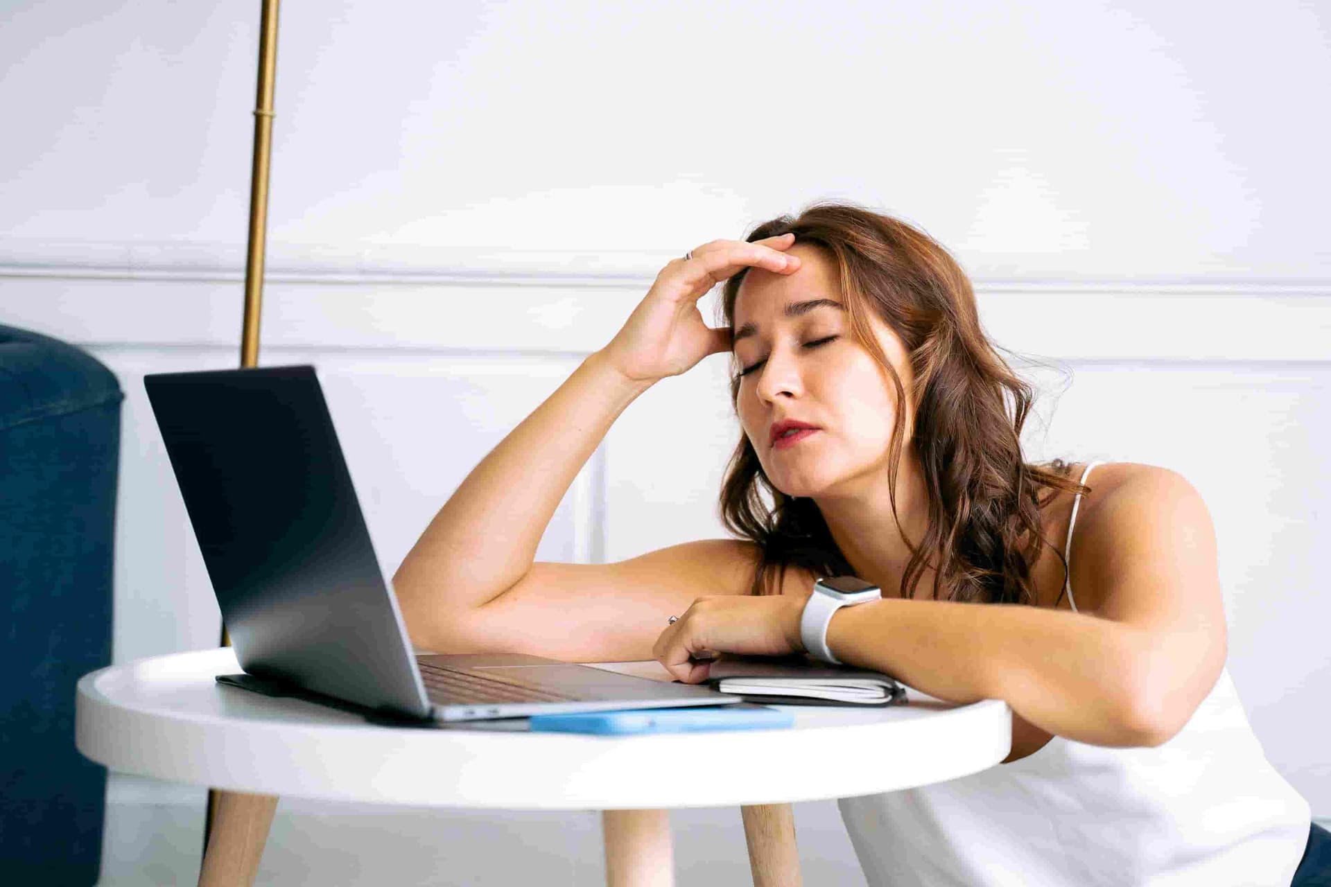 Someone falling asleep while waiting for a slow internet connection to load.